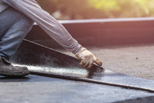 Professional Basement Waterproofing technician working in Juneau, WI
